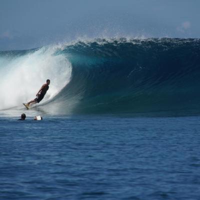Man surfing in Teahupoo